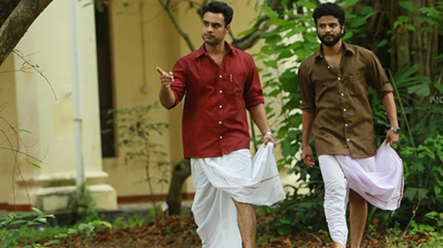 Neeraj and Tovino Thomas in Oru Mexican Aparatha